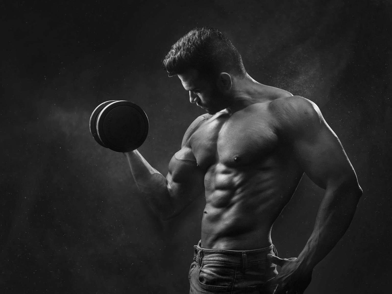 https://www.pexels.com/photo/man-holding-black-dumbbell-1229356/